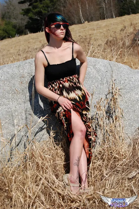 Amateur in Glasses Reveals Her Natural Tits by a Boulder in the Forest – photo 8 of 12