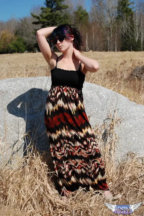 Amateur in Glasses Reveals Her Natural Tits by a Boulder in the Forest – photo 7 of 12