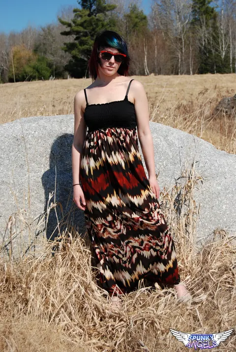 Amateur in Glasses Reveals Her Natural Tits by a Boulder in the Forest – photo 5 of 12