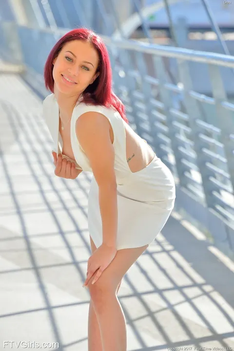Redhead Flashes Her Ass and Pussy on a Bridge in High Heels – photo 3 of 21