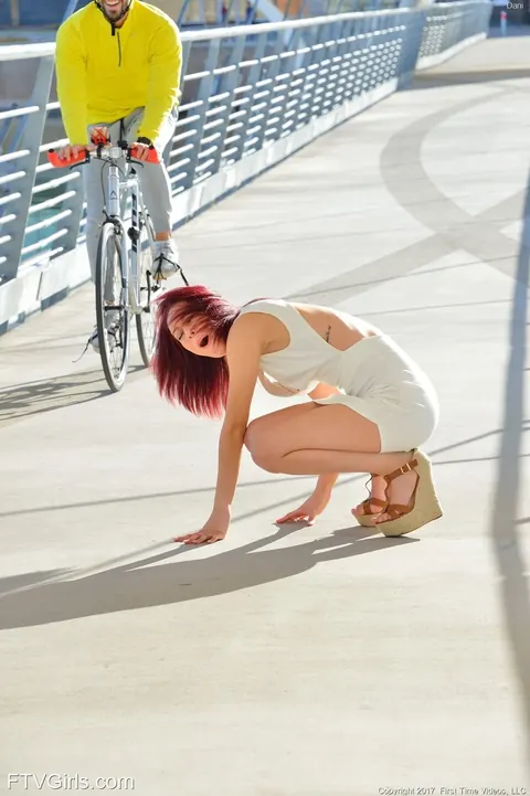 Redhead Flashes Her Ass and Pussy on a Bridge in High Heels – photo 5 of 21