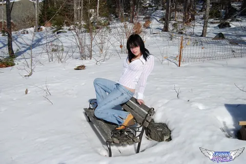 Emily Love: Brunette with Natural Tits Poses in Jeans Outdoors – photo 1 of 12
