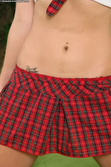 Amateur Redhead with Big Tits Strips Out of Her Skirt and Oils Her Body