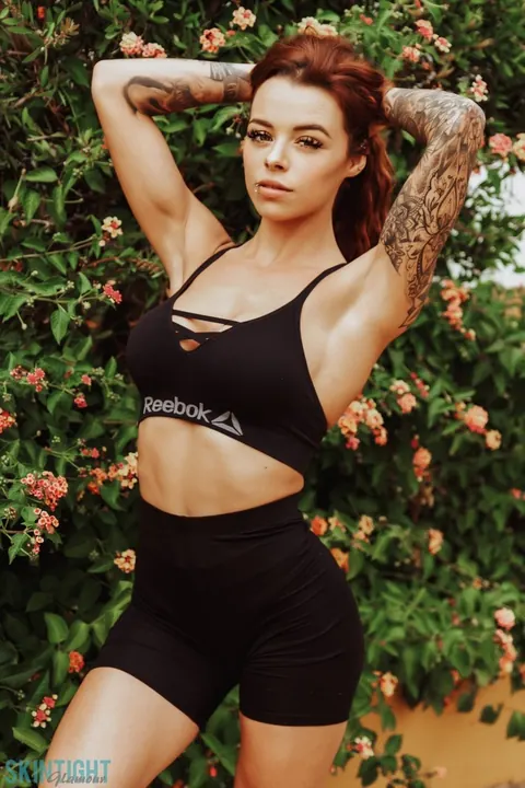Mia Stryker: Busty Redhead Strips Out of Her Panties by Blooming Bushes – photo 2 of 12