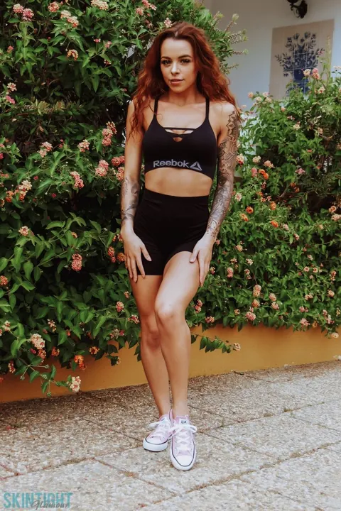 Mia Stryker: Busty Redhead Strips Out of Her Panties by Blooming Bushes – photo 1 of 12