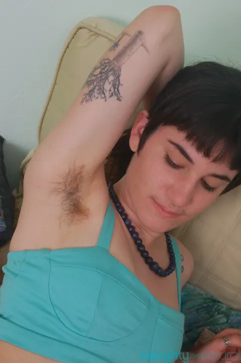 Short-Haired Pale Amateur Strips and Shows Her Hairy Pussy on the Bed – photo 3 of 21