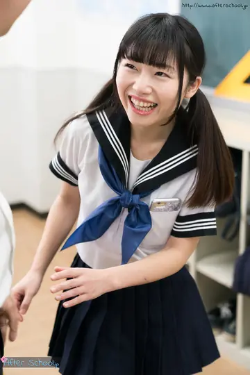 Japanese Brunette Lifts Her Skirt and Fingers Her Pussy