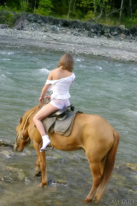 Slim European Blonde Strips Naked on a Horse Outdoors – photo 4 of 20