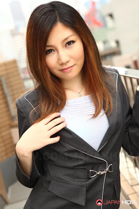 Yuria Kanno: Japanese MILF with Red Hair Poses Outdoors in Her Uniform – photo 14 of 15