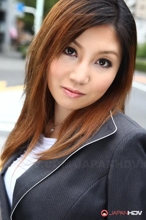 Yuria Kanno: Japanese MILF with Red Hair Poses Outdoors in Her Uniform – photo 6 of 15