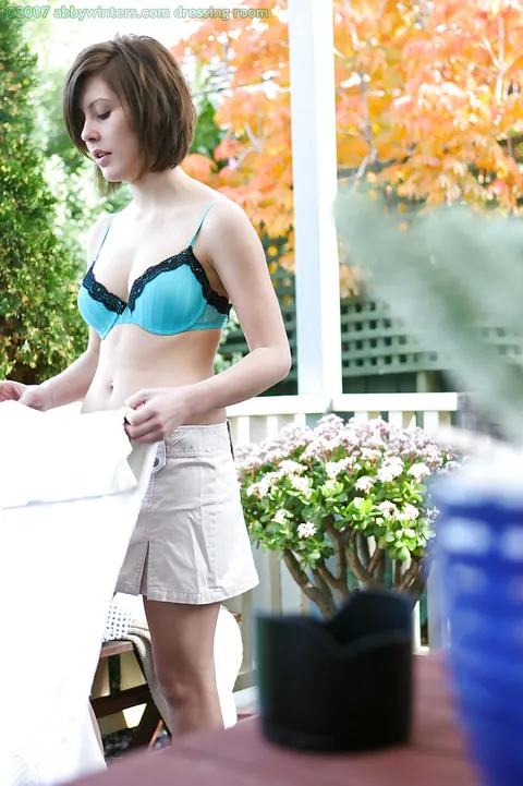 Brunette in Lingerie and Skirt Poses Outdoors – photo 10 of 16