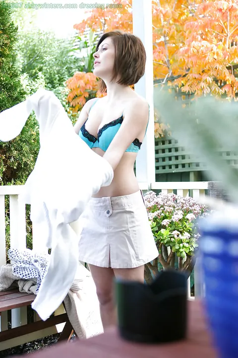 Brunette in Lingerie and Skirt Poses Outdoors – photo 11 of 16