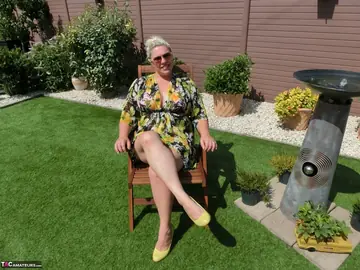 Mature Blonde BBW in a Bikini and Glasses Fingers Her Pussy Outdoors