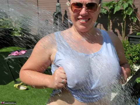 Mature Blonde BBW in a Bikini and Glasses Fingers Her Pussy Outdoors – photo 13 of 16