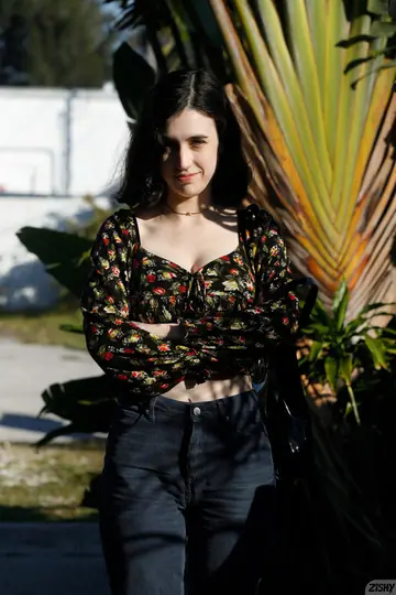Slim Ukrainian Brunette Poses to Show Her Figure