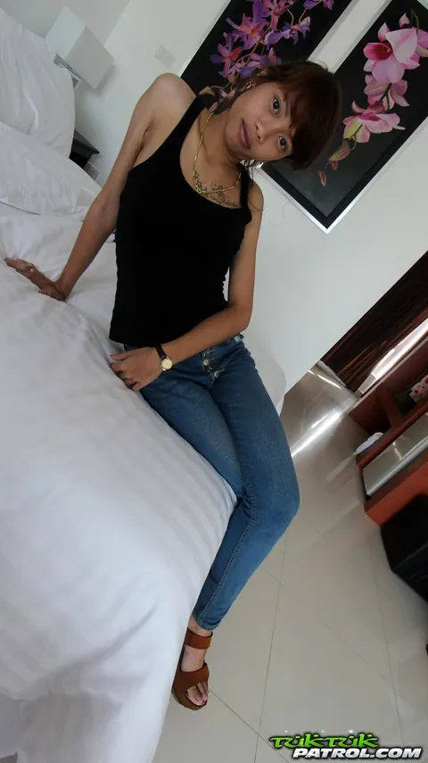 Petite Asian Woman Spreads Her Pussy on the Bed – photo 3 of 21