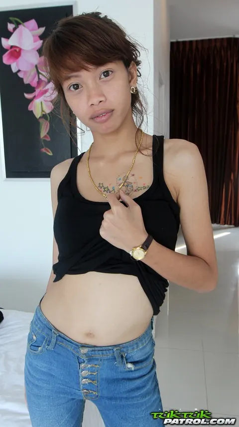 Petite Asian Woman Spreads Her Pussy on the Bed – photo 2 of 21
