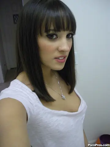 Busty Latina Undresses in the Bathroom Mirror for Selfies
