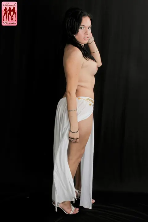 Petite Trans Woman Strips Nude and Poses for the Camera – photo 9 of 16