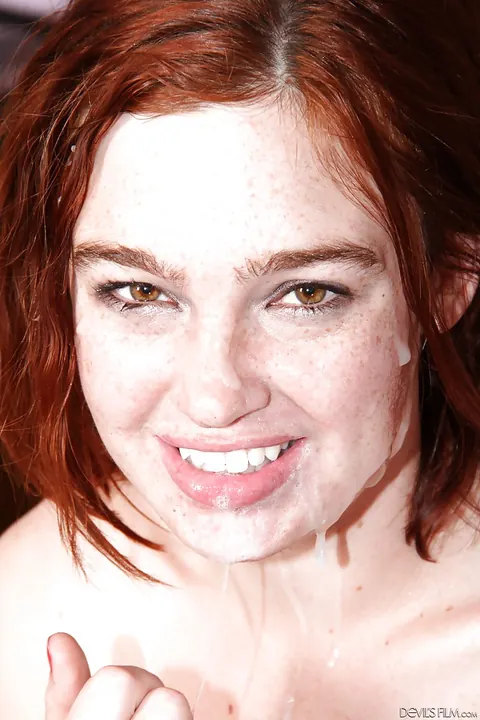 Jodi Taylor: Chubby Redhead with Big Tits Sucks a Group of Black Men – photo 16 of 16
