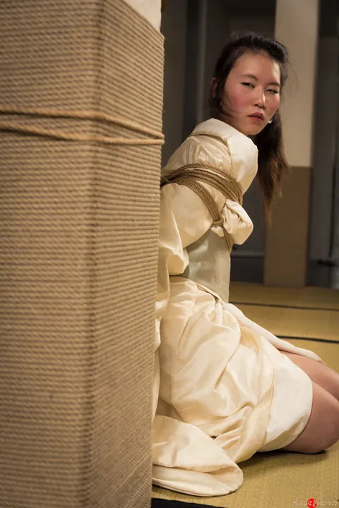 Asian Brunette Restrained with Rope in Shibari Session – photo 6 of 16