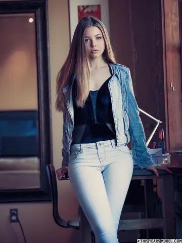 Blonde Strips Out of Her Jeans to Model Nude