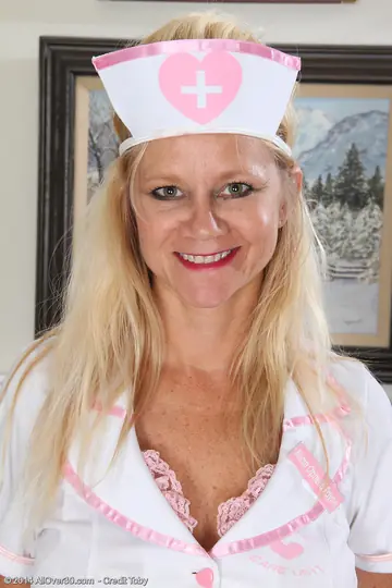 Thick Mature Blonde Nurse Strips Out of Her Uniform