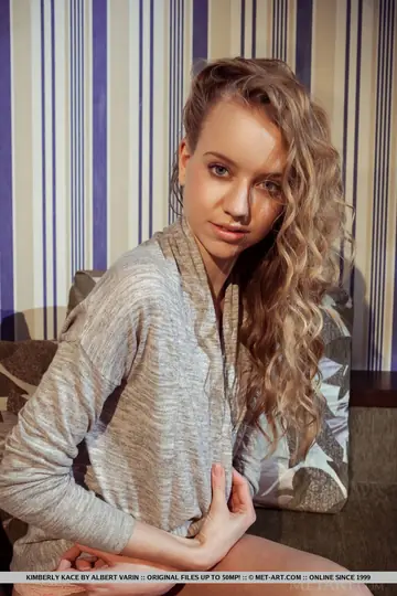 Slim European Blonde Strips and Spreads Her Legs
