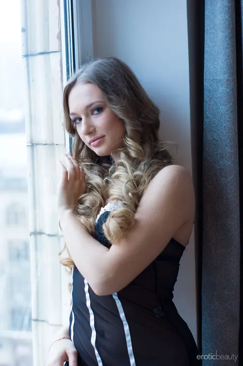 Amy Moore: Tall Blonde Sheds White Stocking on the Window Sill – photo 11 of 16