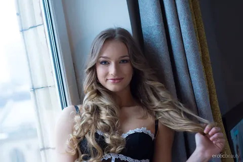 Amy Moore: Tall Blonde Sheds White Stocking on the Window Sill – photo 10 of 16