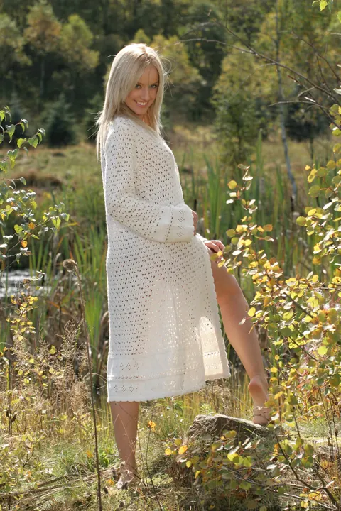 Skinny Blonde Undresses Out of Her Sweater Outdoors – photo 4 of 21