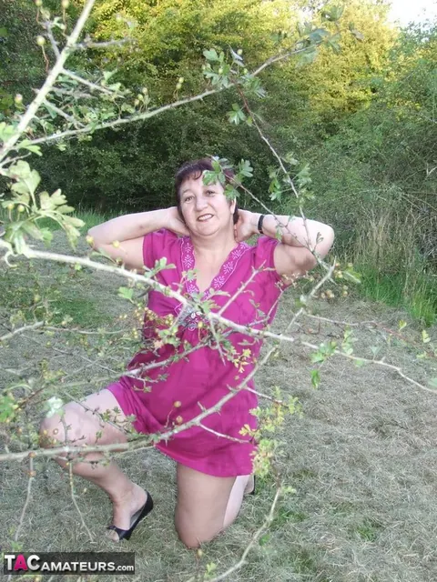 Kinky Carol: Curvy Mature Brunette Strips Out of Her Panties in the Forest – photo 4 of 20