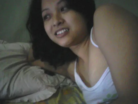 Indian Brunette Bares Her Natural Tits and Armpits in the Bedroom – photo 14 of 15