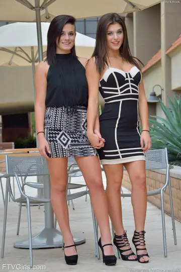 Leah Gotti – Two Busty Lesbians in Lingerie Kiss and Share a Dildo on a Patio