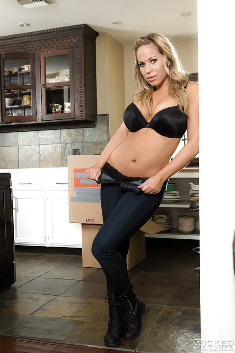 Olivia Austin: Thick Blonde with Big Tits and Piercings Poses in the Kitchen – photo 1 of 12