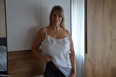 Sweet Susi: Blonde in Lingerie Toys Her Ass with a Butt Plug – photo 9 of 16