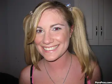 Busty Blonde in Pigtails Spreads Her Pussy Wide