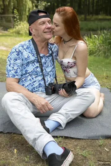 Redhead Fucks Her Lover on a Blanket Outdoors