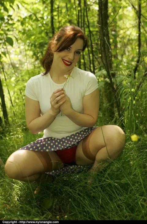 Dirty Angie: Slim Mature Redhead Lifts Her Skirt and Spreads Outdoors – photo 5 of 12