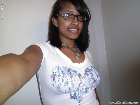 Ebony Babe with Big Tits Wearing Glasses Spreads for a Selfie – photo 1 of 16