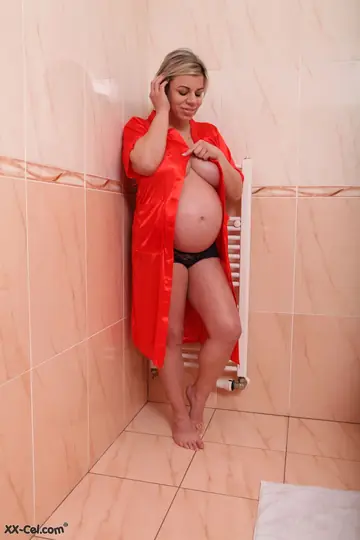 Silvy V – Thick Blonde Pregnant MILF Fingers Herself in the Bathroom