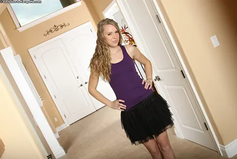 Anna Stevens: Tall Blonde Amateur in a Skirt and Heels Pulls Panties Down – photo 1 of 16