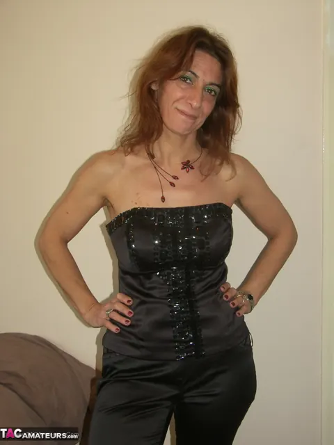 Mature Redhead Strips Off Her Panties and Fingers Her Pussy – photo 3 of 16