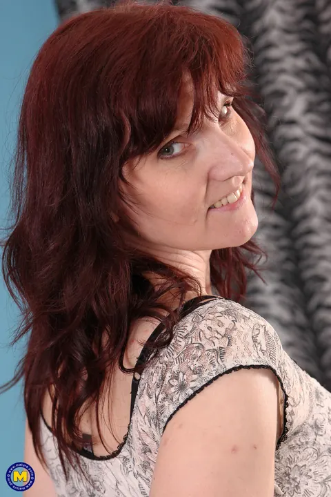 Mature Redhead in Stockings Fingers Her Shaved Pussy – photo 2 of 21