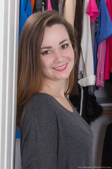Petite Brunette Undresses in a Dressing Room and Spreads Her Hairy Pussy