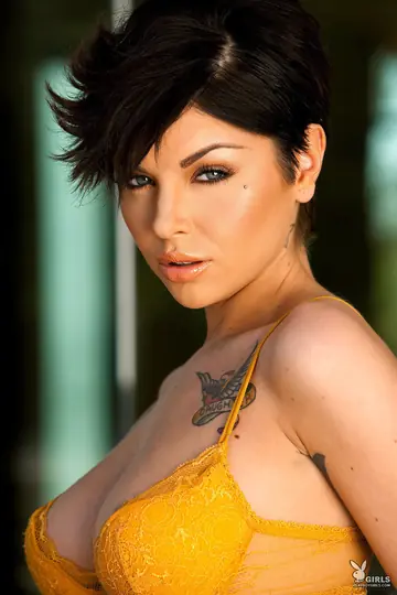 Short-Haired Brunette with Big Natural Tits Strips and Spreads Outdoors