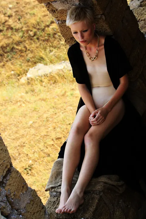 Two Slim Short-Haired Women Kiss and Spread Outdoors – photo 6 of 21