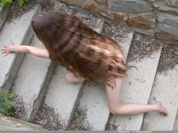 Woman Undresses and Poses Nude Front and Back for the Archive