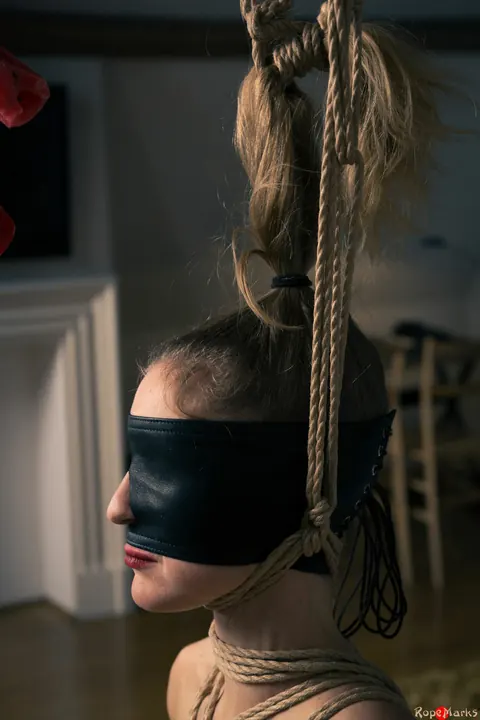 Dutch Woman with Pigtails Hangs Suspended in Rope Bondage – photo 7 of 16