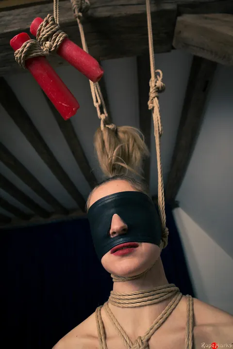 Dutch Woman with Pigtails Hangs Suspended in Rope Bondage – photo 4 of 16